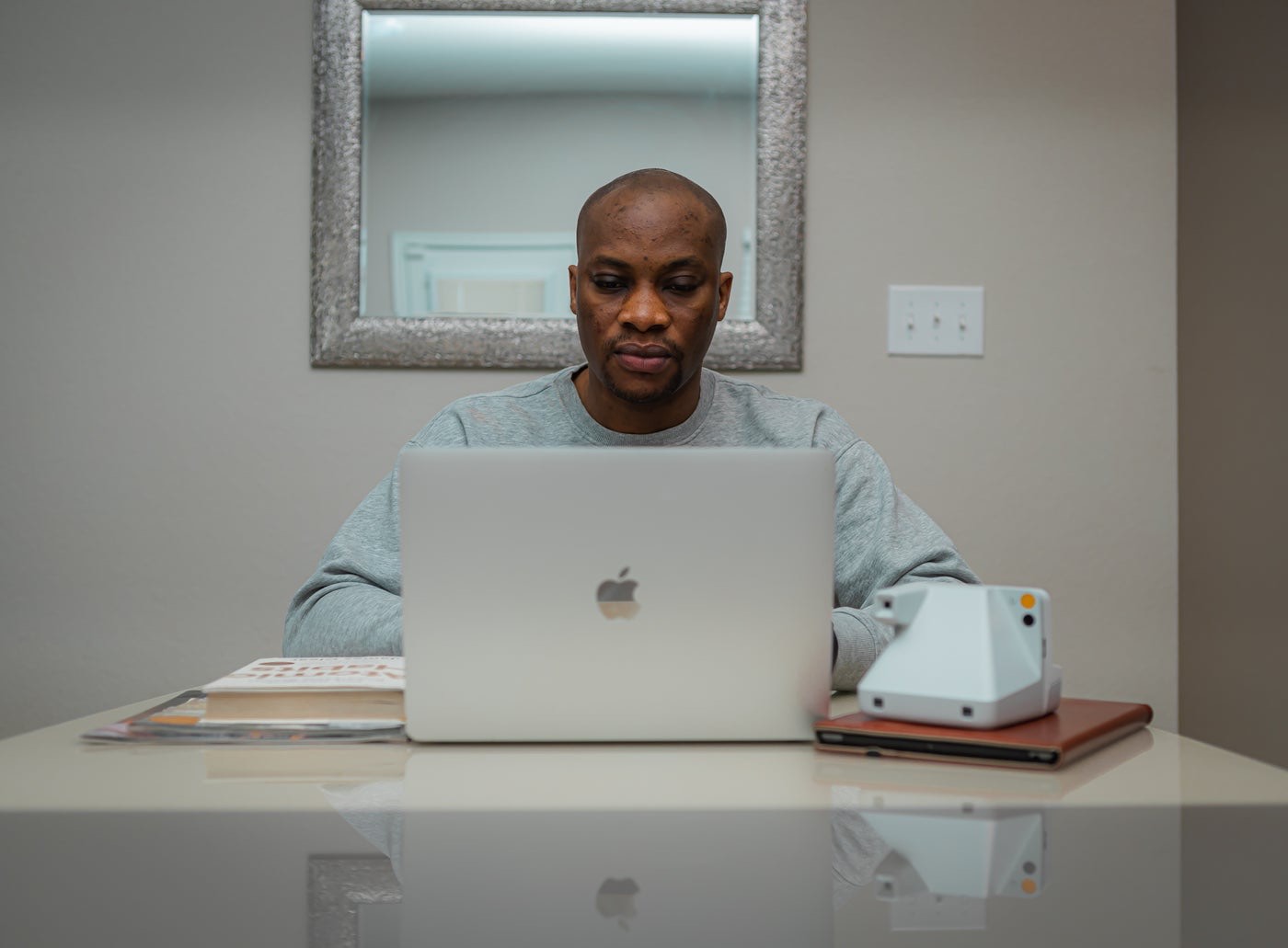 An engineer working through a sprint at his laptop
